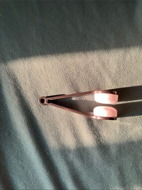 Pink and Rose Gold eyeglass cleaning device
